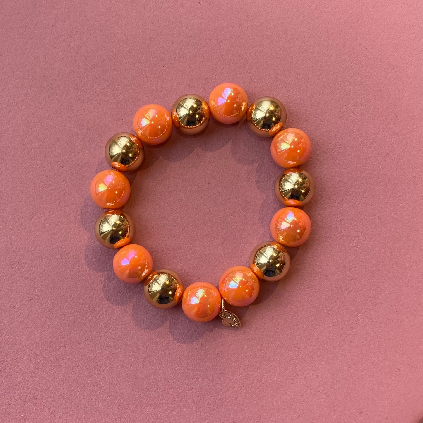Armband kralen oranje/goud metallic