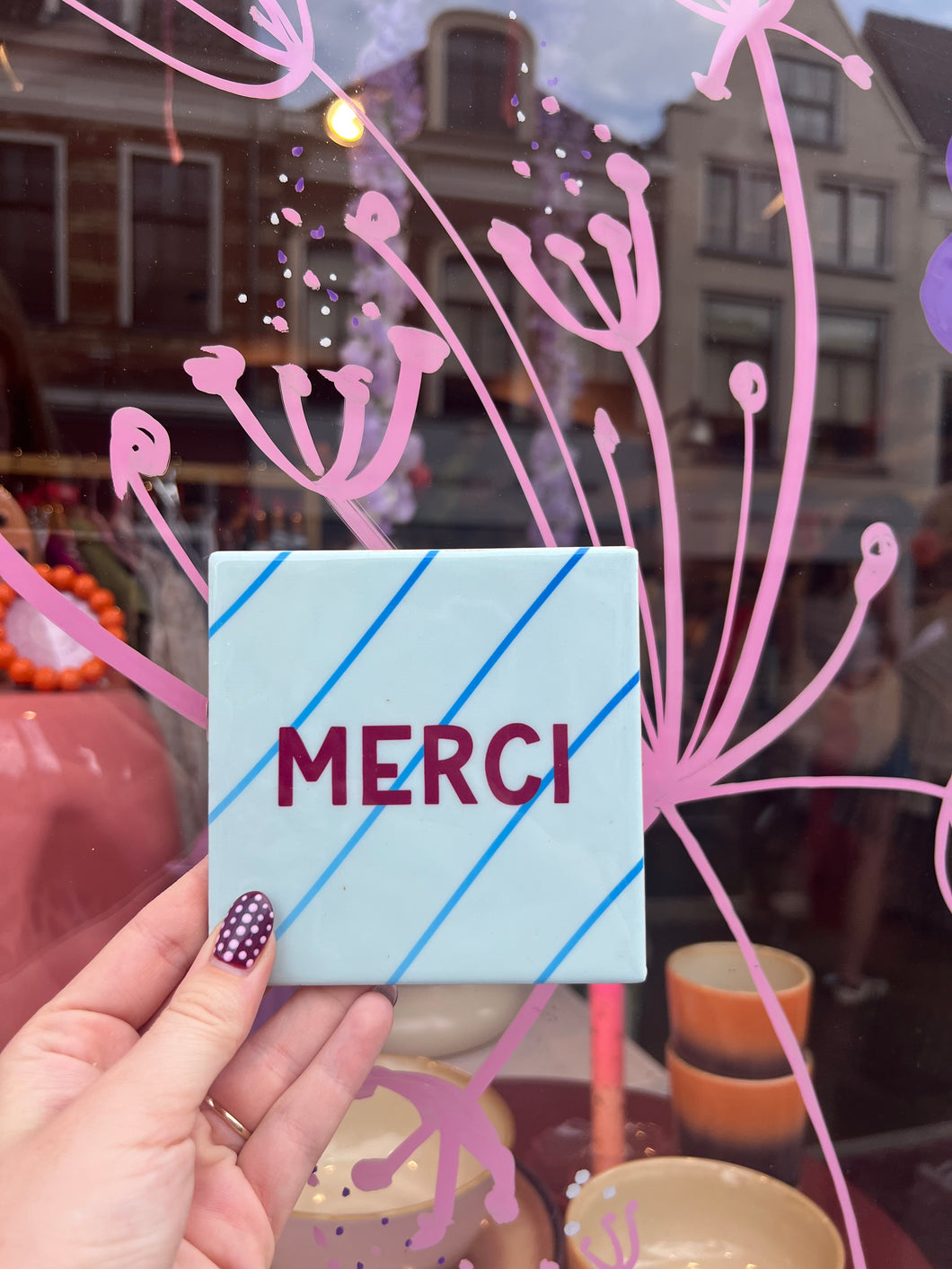 Tegeltje - Merci