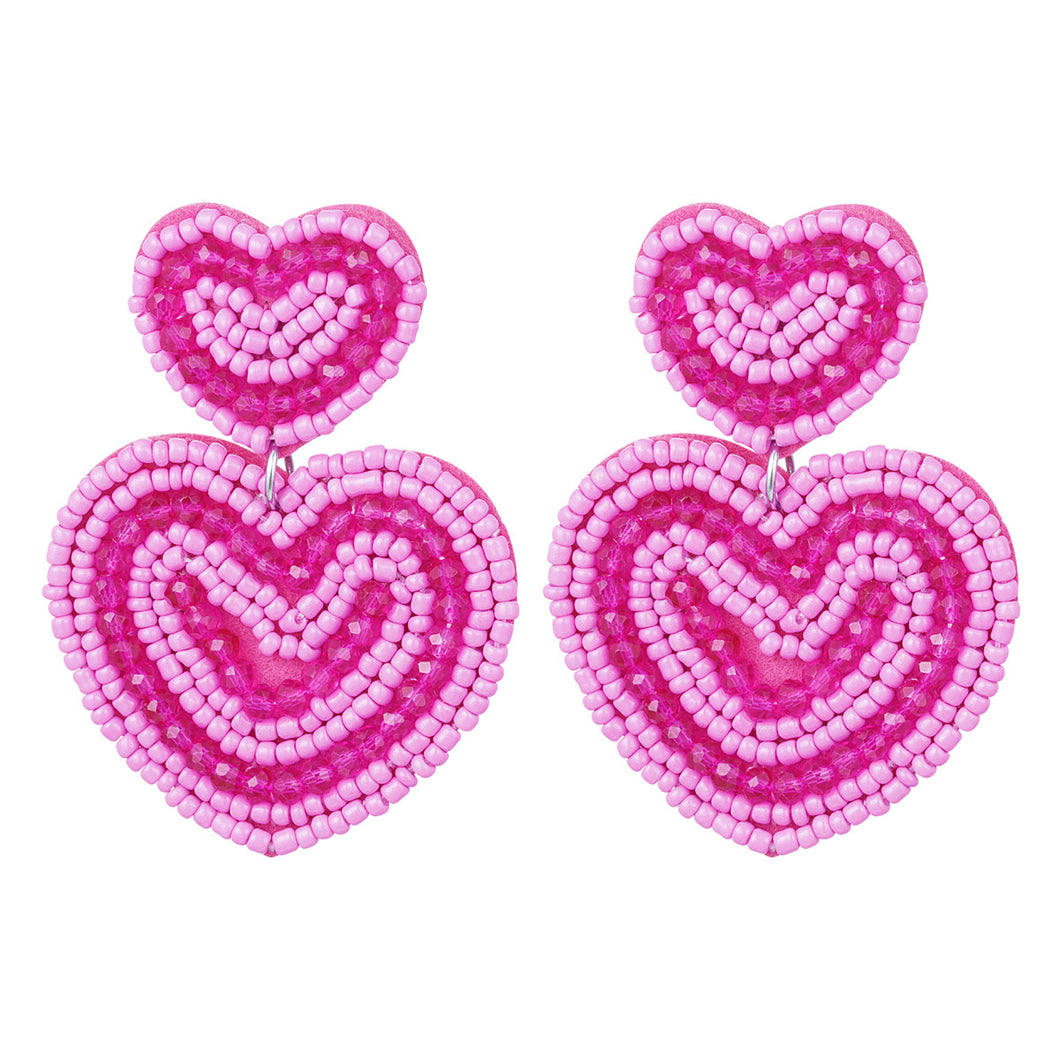 Oorbellen kralen hartjes - Fuchsia
